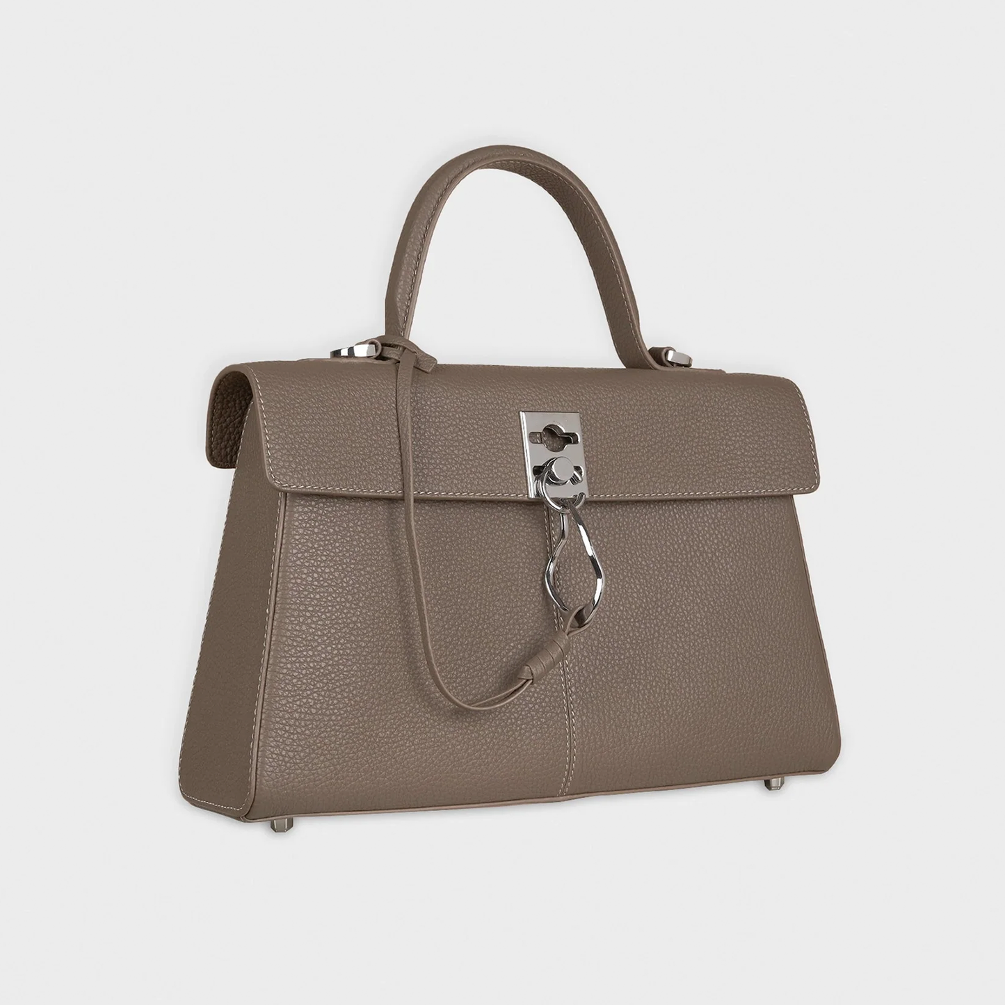Muted Earthy Taupe Grain Textured Sleek Trapezoid Flap Tote With Distinctive Curved Ring Metal Clasp And Base Protective Studs