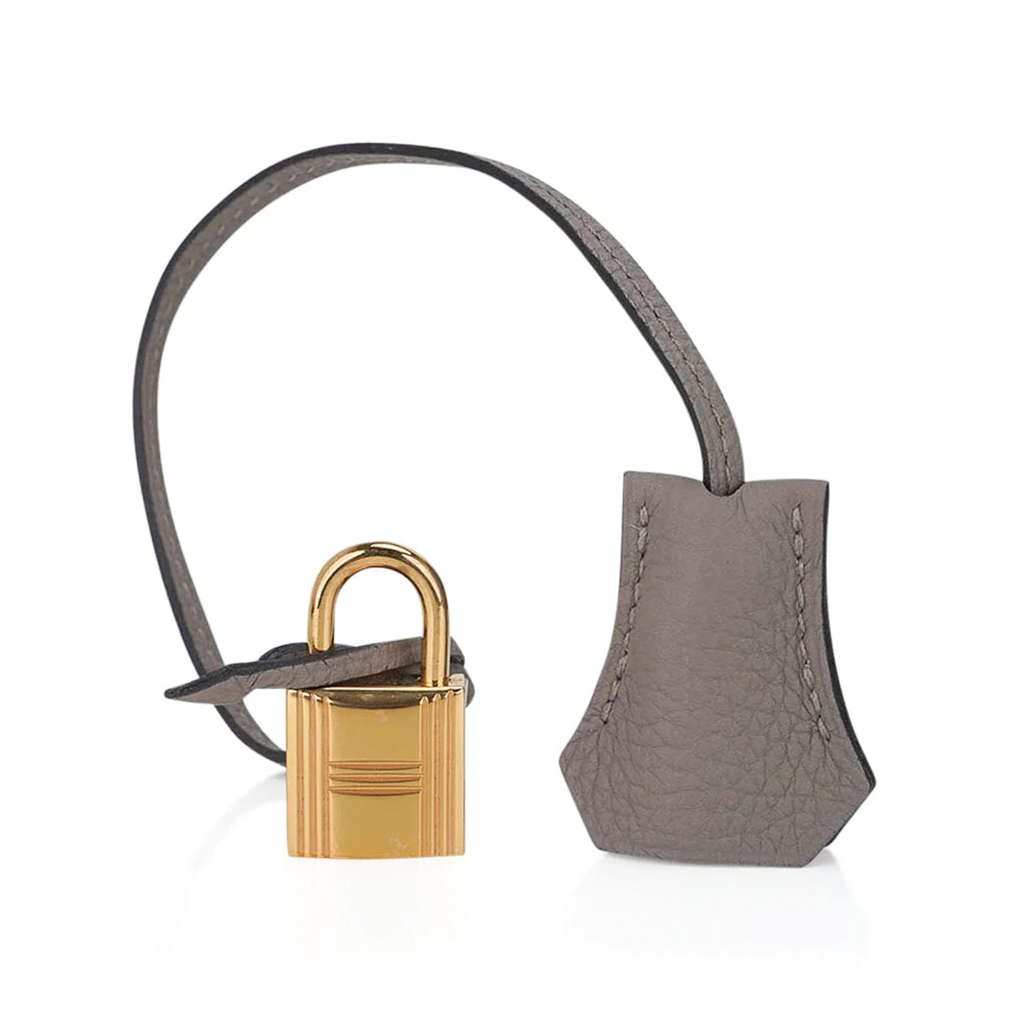 Muted Ash Gray Pebble Grain Large Trapezoid Hand Tote With Warm Polished Golden Twist Lock Hardware And Matching Suspended Engraved Metal Padlock Charm