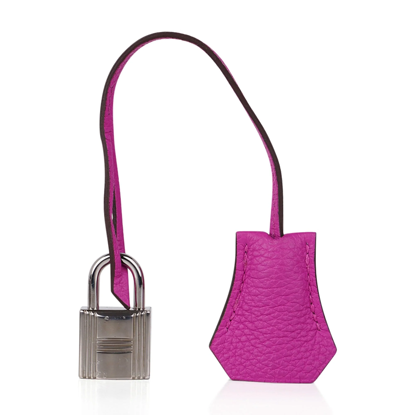 Vivid Saturated Magenta Pebble Grain Compact Trapezoid Hand Tote With Cool Polished Silvery Twist Lock Hardware And Matching Suspended Engraved Metal Padlock Charm